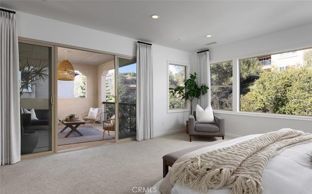 bedroom featuring carpet and access to outside