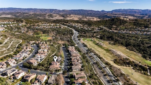 drone / aerial view featuring a mountain view