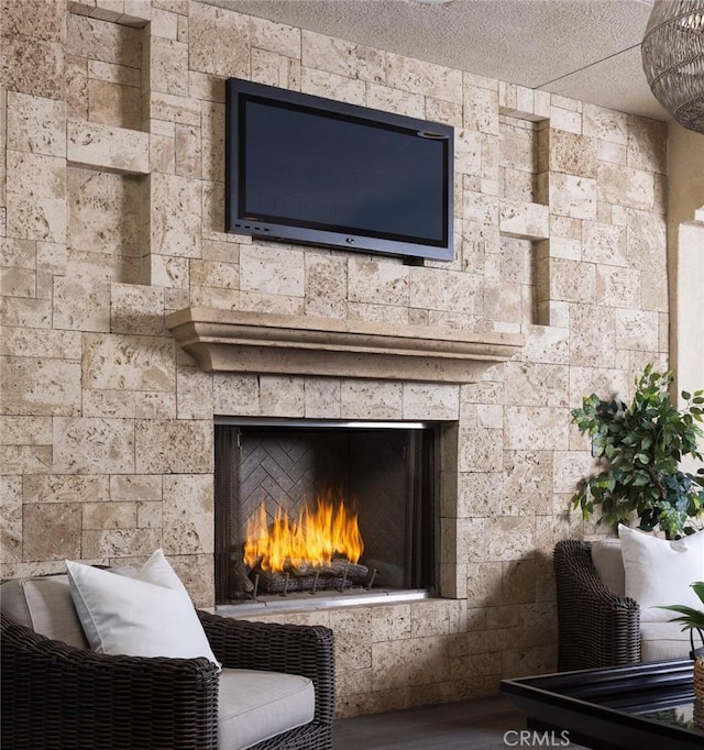 room details featuring a tile fireplace