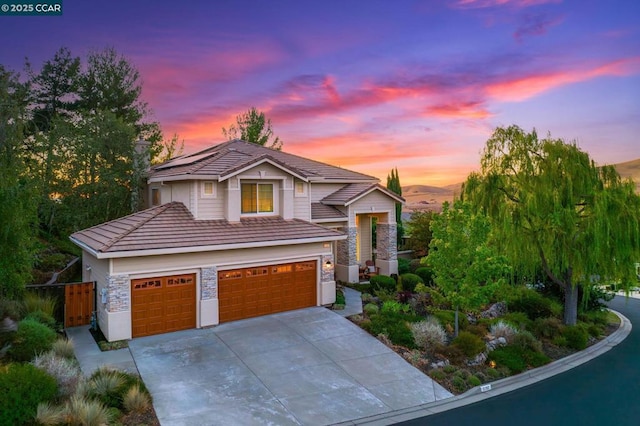 front facade with a garage