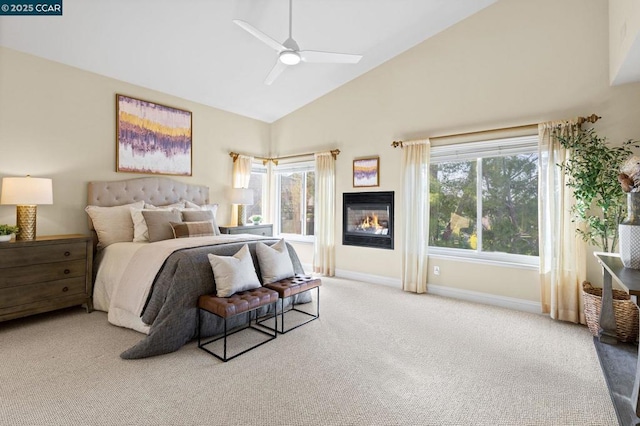 bedroom with high vaulted ceiling, carpet floors, and ceiling fan