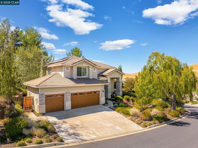 view of front of house with a garage