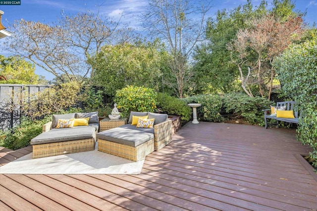 wooden deck featuring outdoor lounge area