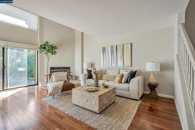 living room with dark wood-type flooring