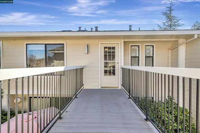 doorway to property featuring a balcony