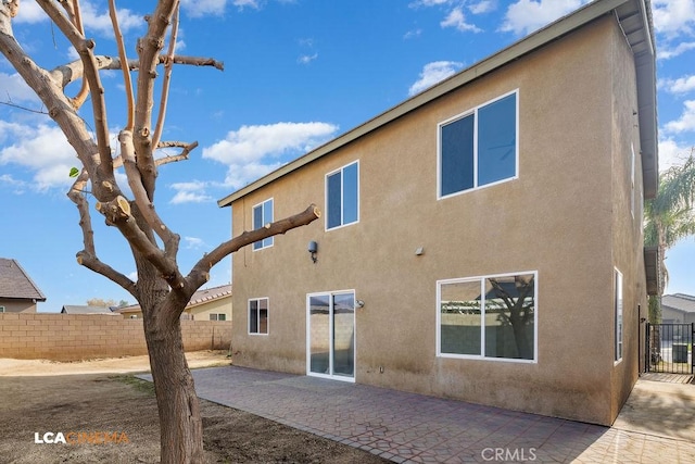 rear view of house with a patio area