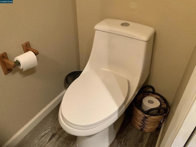 bathroom featuring toilet