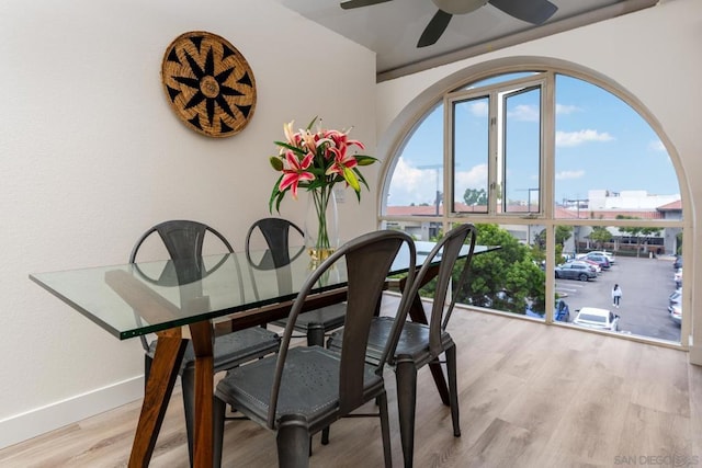 dining area featuring ceiling fan and light hardwood / wood-style flooring