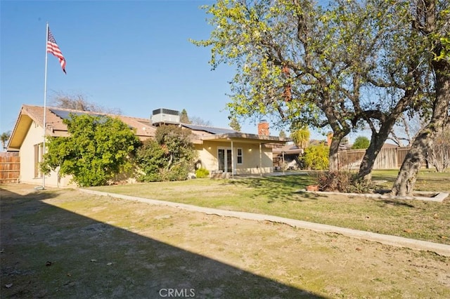 exterior space featuring a front yard