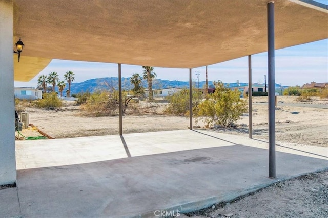 view of patio featuring a mountain view