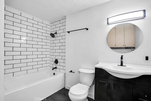 full bathroom featuring toilet, vanity, tile patterned floors, and tiled shower / bath combo