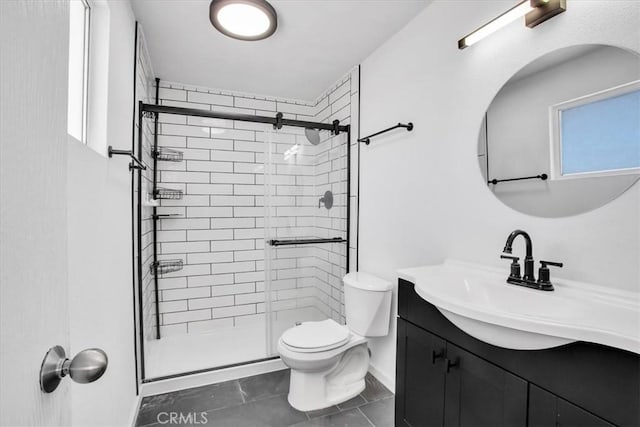 bathroom with a shower with door, tile patterned flooring, vanity, and toilet