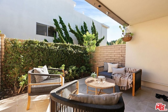 view of patio / terrace with an outdoor hangout area