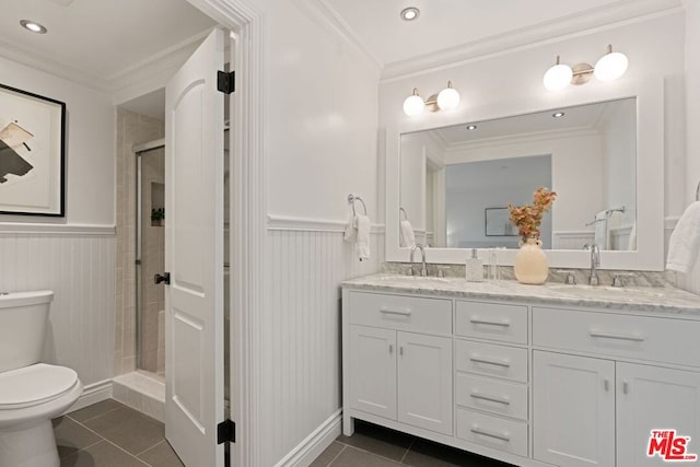 bathroom featuring toilet, ornamental molding, and tile patterned floors