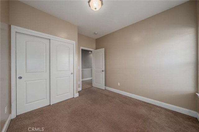10401 Point Lakeview Rd, Kelseyville, CA 95451 - unfurnished bedroom with a closet, carpet flooring, and baseboards