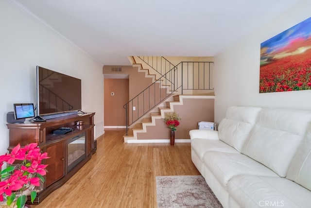 living room with light hardwood / wood-style flooring