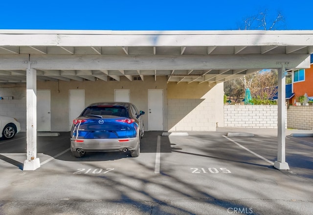 view of car parking with a carport