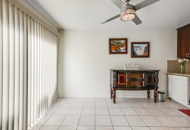 interior space featuring ceiling fan