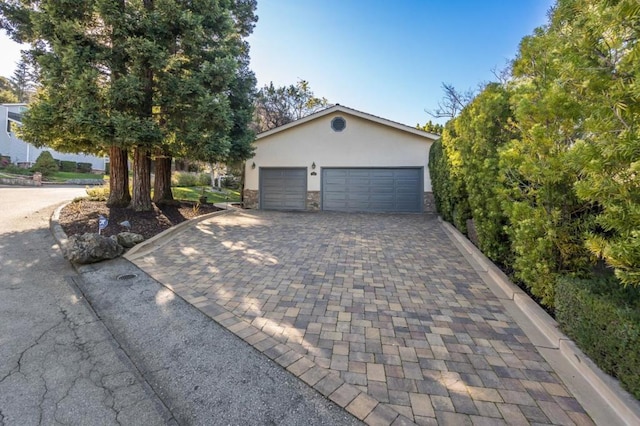 view of front of property with a garage