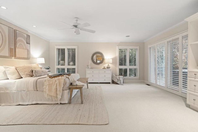 bedroom featuring light carpet, ceiling fan, crown molding, and access to outside