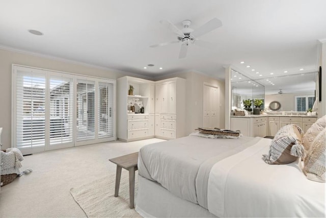 carpeted bedroom with ceiling fan, access to exterior, a closet, and crown molding