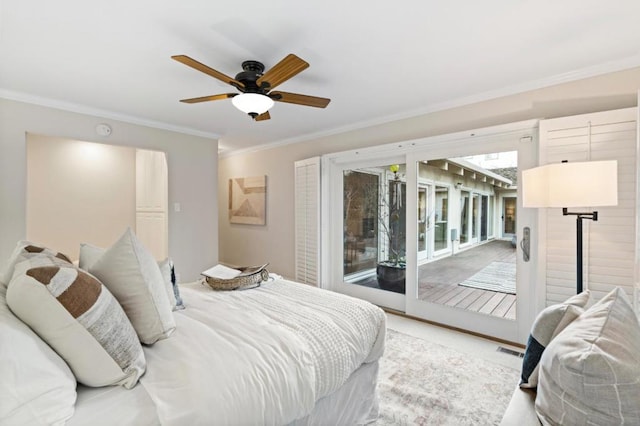 bedroom with ceiling fan, crown molding, and access to outside