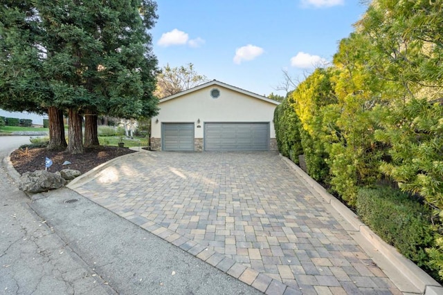 view of front of house with a garage