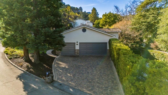 view of front of home with a garage