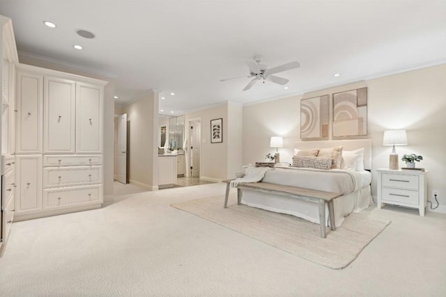 carpeted bedroom with ceiling fan and crown molding