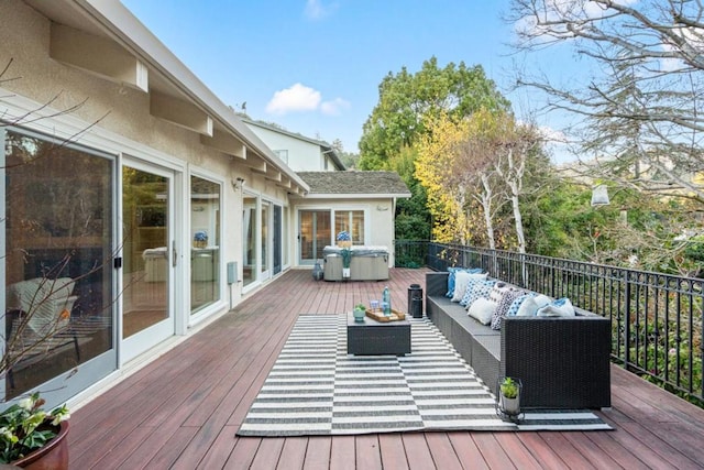 deck with an outdoor hangout area