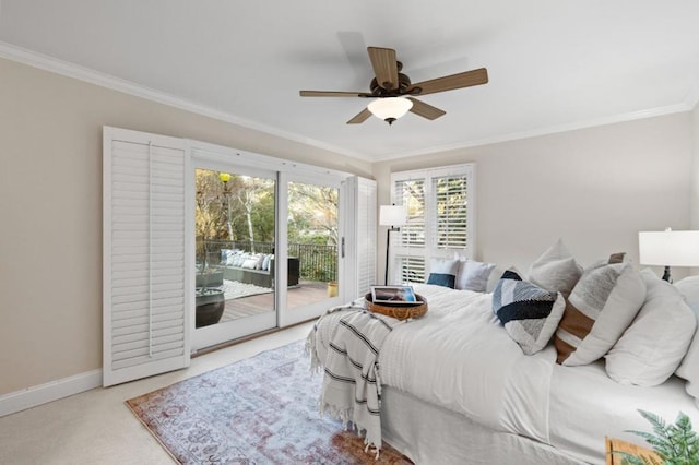 carpeted bedroom featuring ceiling fan, ornamental molding, and access to outside