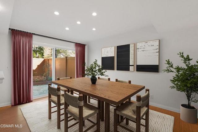 dining room with light wood-type flooring