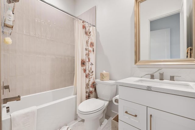 full bathroom featuring toilet, shower / tub combo, and vanity