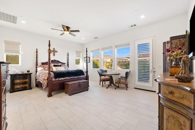 tiled bedroom with ceiling fan and access to exterior