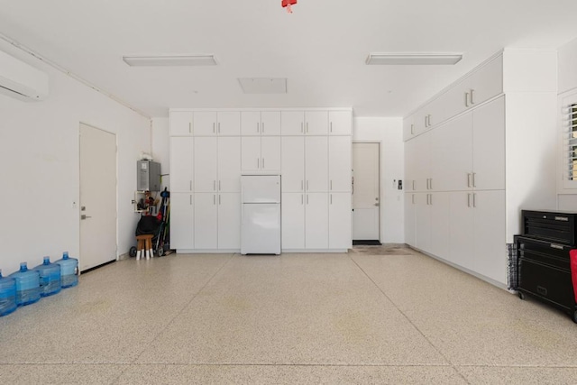 garage with water heater, white refrigerator, and a wall mounted air conditioner