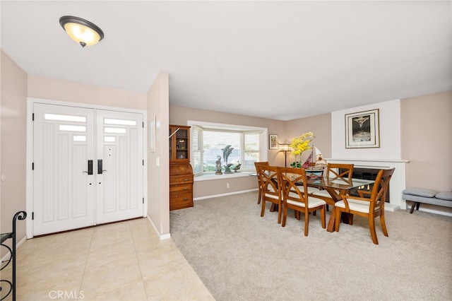 view of carpeted dining space