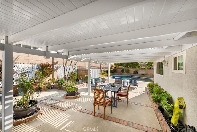 view of patio / terrace with a pergola and a fenced in pool