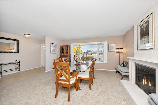 view of carpeted dining area