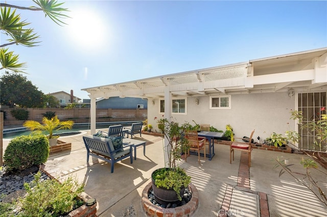 view of patio / terrace with a pergola and a fenced in pool