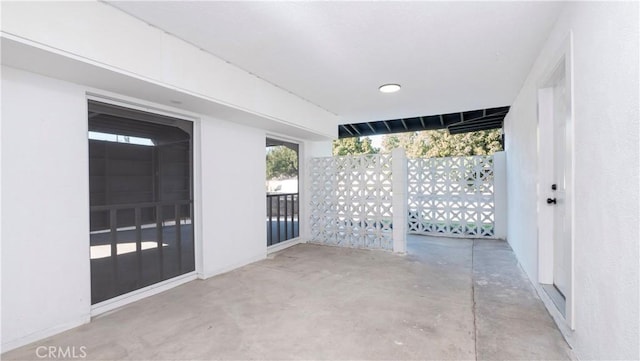 interior space featuring concrete flooring