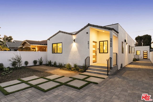 view of front of house with a patio