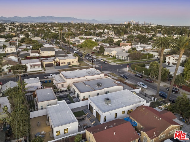 aerial view at dusk with a mountain view