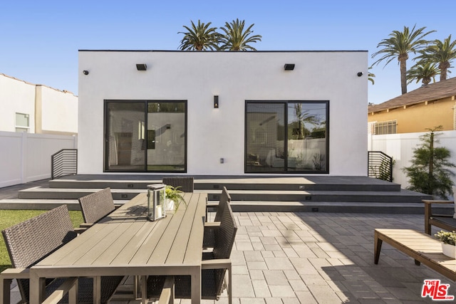 rear view of house with a patio area