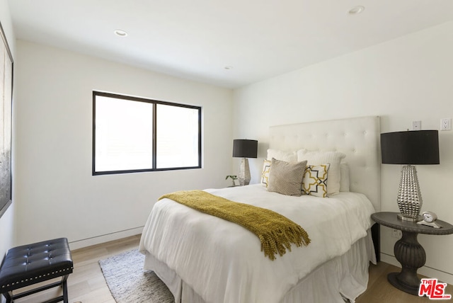 bedroom featuring light hardwood / wood-style flooring