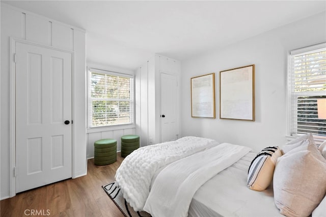 bedroom with light hardwood / wood-style floors