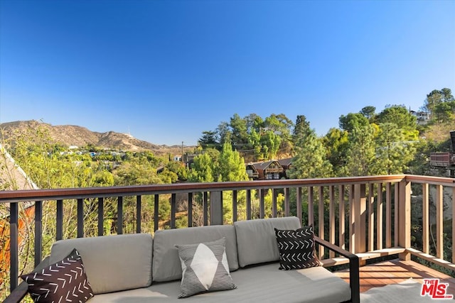 deck with a mountain view