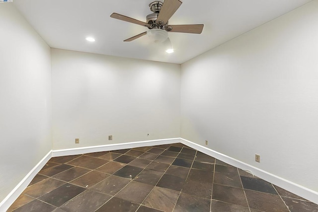 unfurnished room with ceiling fan