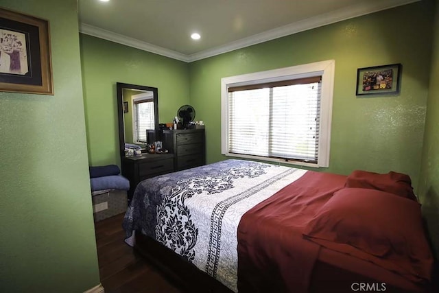 bedroom featuring recessed lighting, wood finished floors, and crown molding