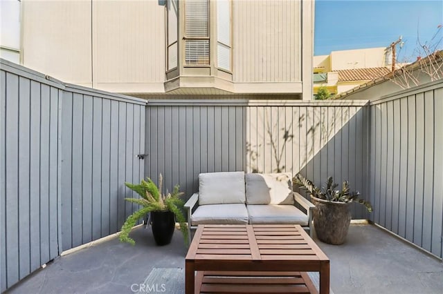 balcony with a patio and outdoor lounge area