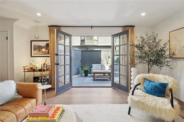 doorway to outside with hardwood / wood-style floors and french doors